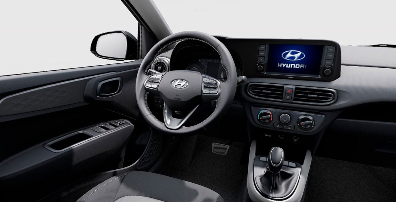 Hyundai i10 Klass 66cv Auto. 4 Hyundai i10 Klass Auto interior delantera 2 | Avanti Renting